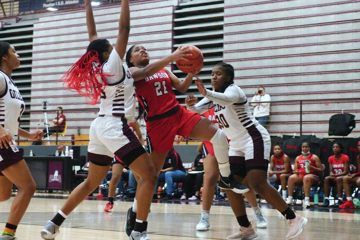Dawson’s Kennedy Ford (21) is the Lady Eagles' go-to player, but head coach Sharee Griffin is receiving contributions from multiple players in Dawson's 10-7 start this season.