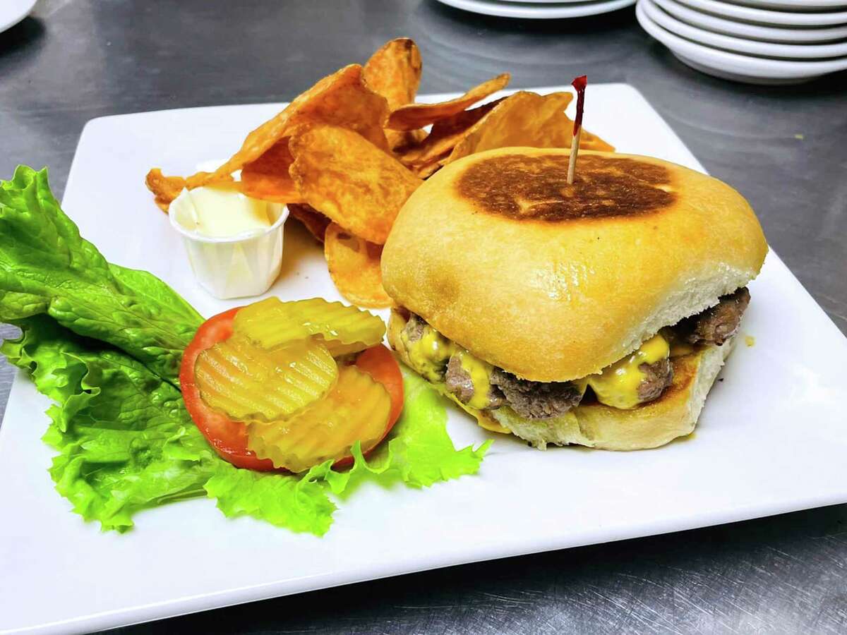 A cheeseburger with housemade potato chips is part of the menu at 1838 Grill, set to open soon in New Braunfels.