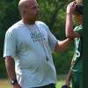 Shenendehowa JV soccer coach Cassidy Jones mentors player Connor Van Sise.