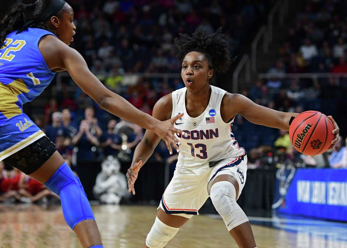 UConn's Christyn Williams looks to make a move to the net against UCLA's Kennedy Burke in a semifinal for the Albany Regional of the NCAA Women's Basketball Championship at the Times Union Center on Friday, March 29, 2019 in Albany, N.Y. (Lori Van Buren/Times Union)