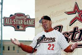 Roger Clemens gestures as he answers questions from the media during a press conference to announce the signing of Clemens to a 1-year $5 million contract with the Houston Astros on January 12, 2004 at Minute Maid Park in Houston, Texas.