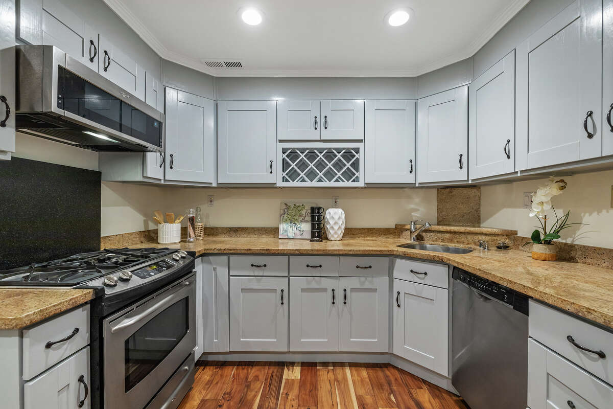 The lower level kitchen is spacious and well-equipped. 