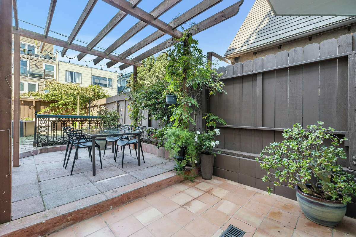 Lower unit residents will enjoy a gorgeous patio and protected alfresco dining access.