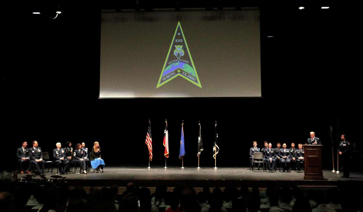 Lieutenant Colonel Timothy Lambert, Senior Aerospace Science Instructor revels the new Space Force JROTC patch during a conversion ceremony turning the AFJROTC TX-20005 into the Space Force JROTC at Klein High School, Tuesday, Jan., in Klein. Klein High’s AFJROTC is one of 10 schools across the nation, and the only unit from the state of Texas chosen to spearhead this conversion to the new branch of the armed services. “It is definitely an honor to be chosen to be one of 10 inaugural Space Force JROTC units,” said Lt. Colonel Timothy Lambert, Senior Aerospace Science Instructor. U.S. Space Command is the Unified Combatant Command responsible for conducting operations in, from, and to space to deter conflict, and if necessary, defeat aggression, deliver space combat power for the Joint/Combined force, and defend U.S. vital interests with allies and partners.
