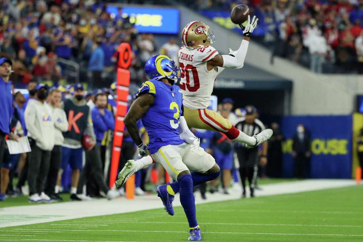 INGLEWOOD, CALIFORNIA - JANUARY 09: Ambry Thomas #20 of the San Francisco 49ers makes a game-ending interception in overtime against the Los Angeles Rams at SoFi Stadium on January 09, 2022 in Inglewood, California. (Photo by Katelyn Mulcahy/Getty Images)
