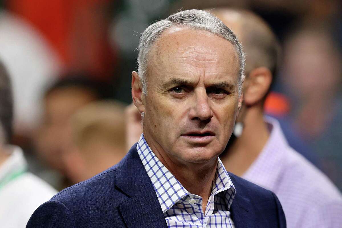 In this file photo, Major League Baseball Commissioner Rob Manfred looks on prior to Game 1 of the World Series between the Atlanta Braves and the Houston Astros at Minute Maid Park on Oct. 26, 2021 in Houston. (Bob Levey/Getty Images/TNS)