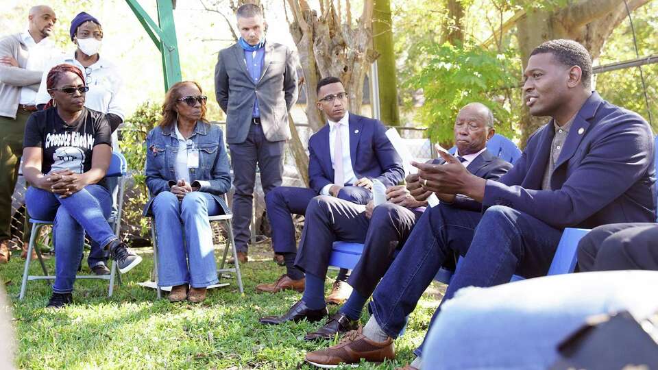 EPA Administrator Michael S. Regan talks to neighbors in the Fifth Ward during a tour in Houston on Friday, Nov. 19, 2021. Administrator Regan's stop was part of a week-long trip through Mississippi, Louisiana and Texas to highlight environmental justice concerns, hear from impacted communities and discuss solutions for communities most in need.