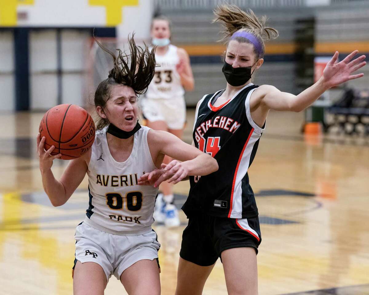 Averill Park junior Bailee Lange tries to get by Bethlehem sophomore Caroline Davis during a Suburban Council matchup at Averill Park High School on Tuesday, Jan. 25, 2022. (Jim Franco/Special to the Times Union)