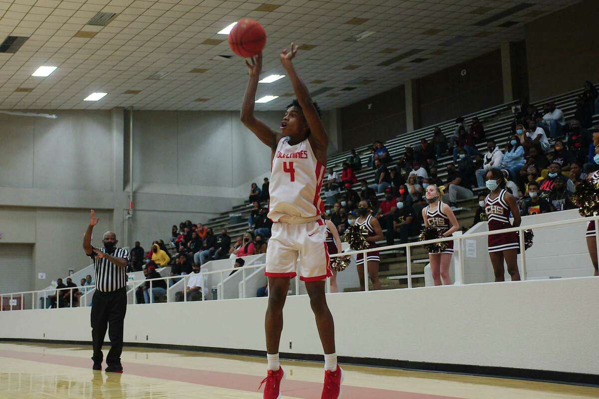 Clear Brook’s Marcus Millender (4) and the rest of the Wolverines downed Clear Creek Tuesday night to maintain a share of the District 24-6A boys’ basketball lead.