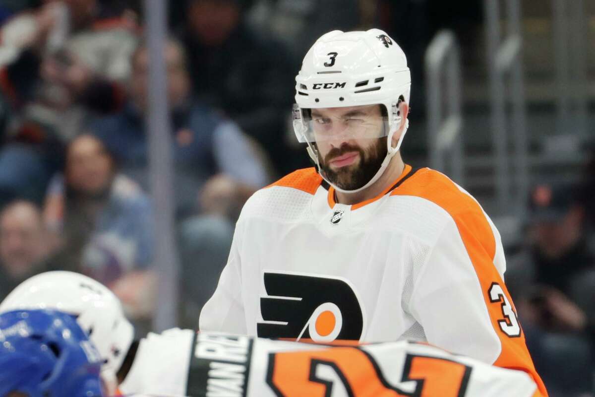 Philadelphia Flyers defenseman Keith Yandle (3) gestures before the first period of an NHL hockey game against the New York Islanders, Tuesday, Jan. 25, 2022, in Elmont, N.Y. Yandle broke an NHL record by playing in his 965th consecutive game on Tuesday. (AP Photo/Corey Sipkin)