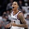 Connecticut's Jordan Hawkins reacts in the second half of an NCAA college basketball game against Georgetown, Tuesday, Jan. 25, 2022, in Storrs, Conn. (AP Photo/Jessica Hill)
