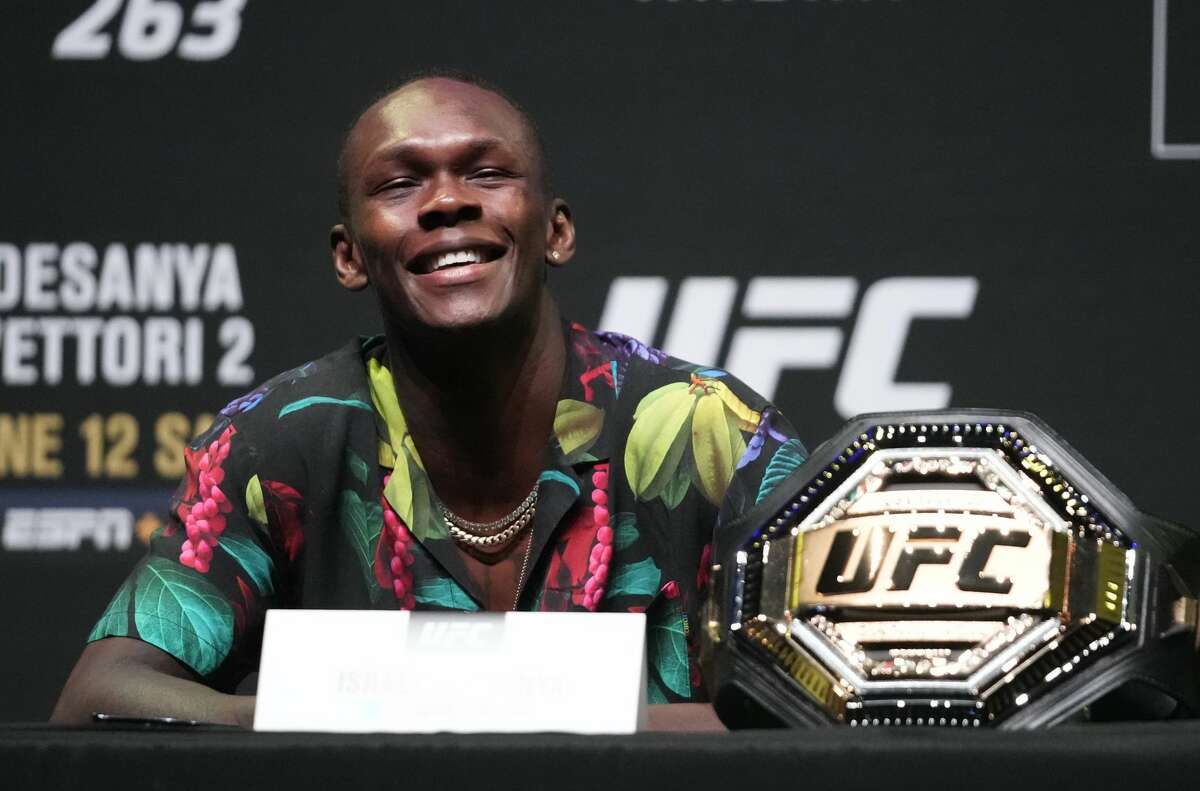 Israel Adesanya interacts with media during the UFC 263 press conference at Arizona Federal Theater on June 10, 2021 in Phoenix, Arizona.