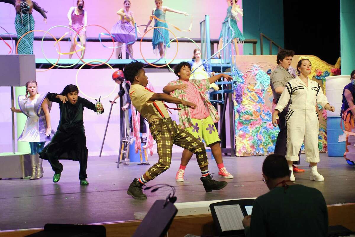 The cast of "The SpongeBob Musical" rehearse a scene at Clear Springs High School.