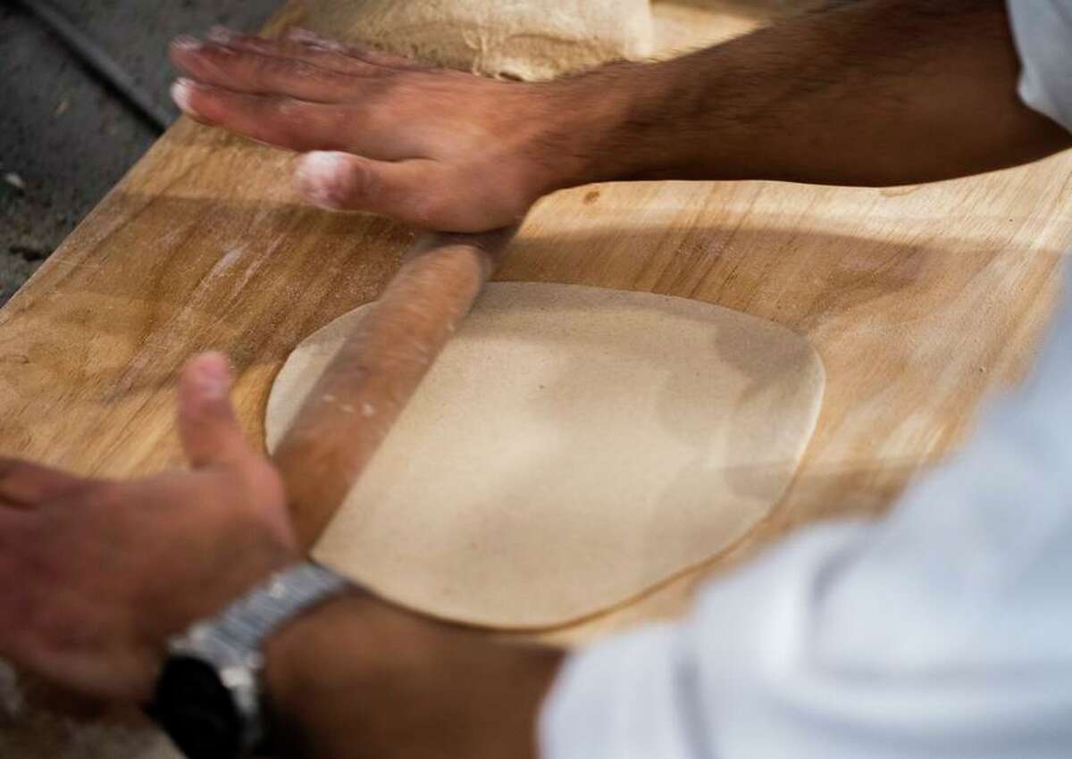 Alsaidi combines grains from his childhood in Yemen, such as sorghum and millet, to create a gluten-free flatbread.
