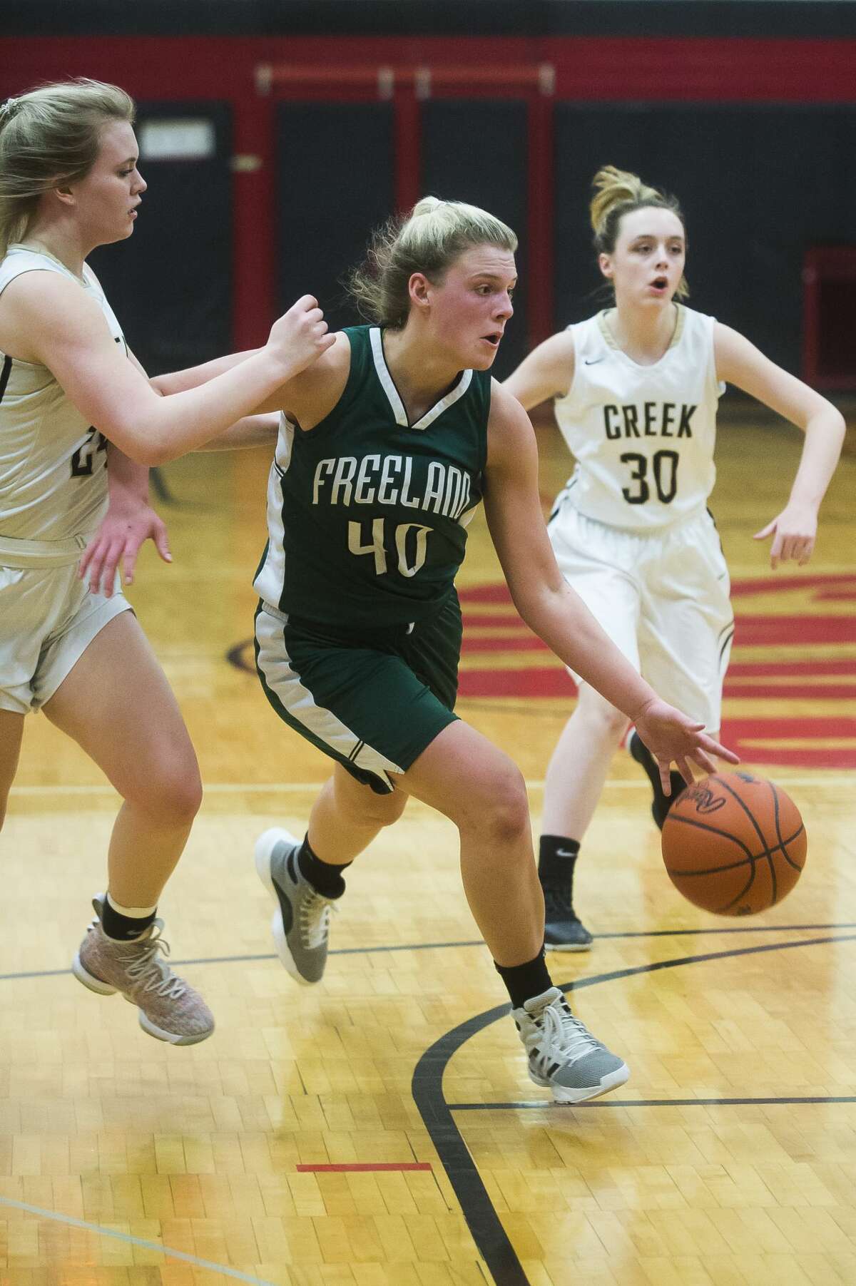 Freeland's Kadyn Blanchard drives into the lane during a March 2, 2020 district game against Bullock Creek.