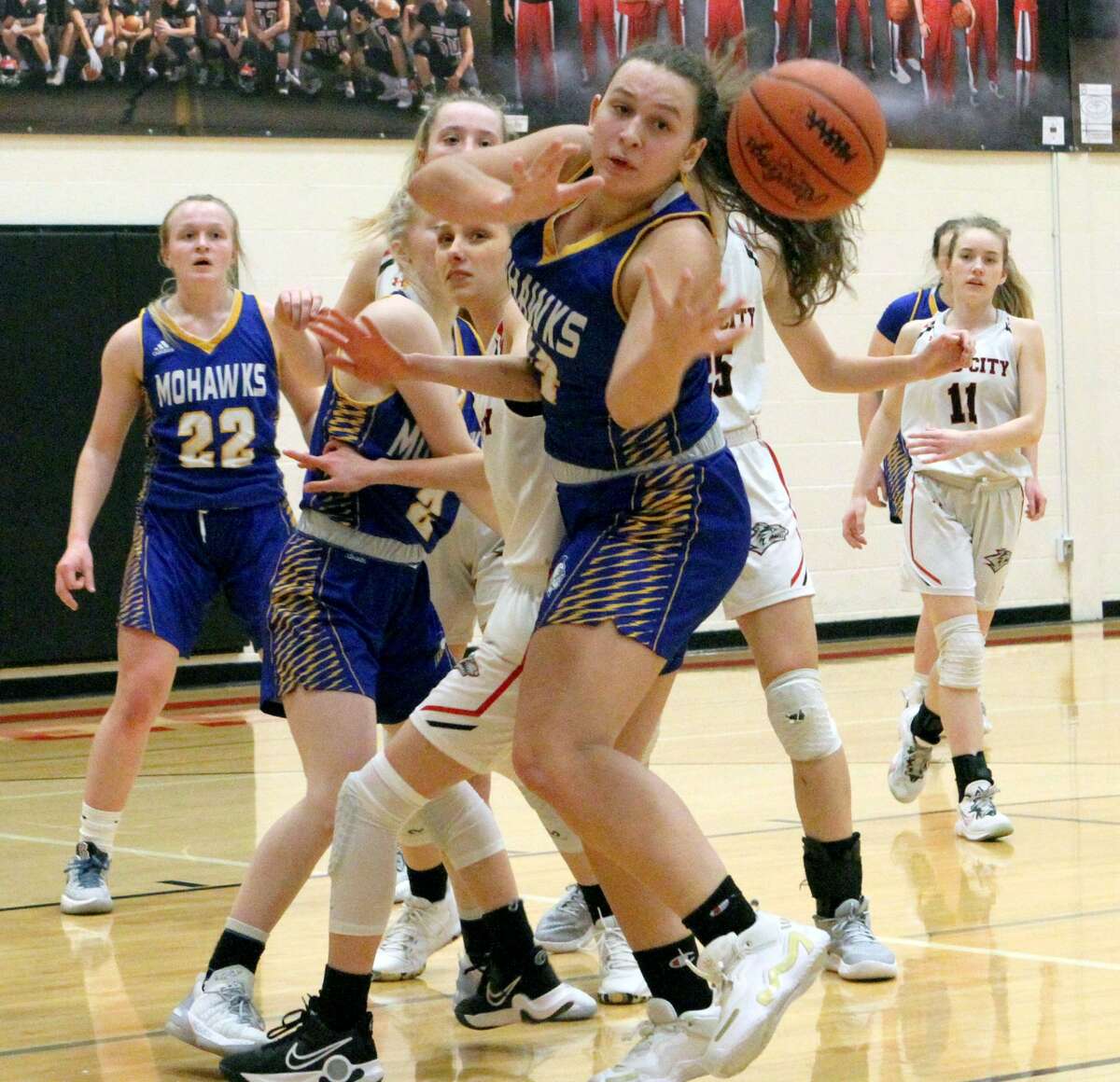 Morley Stanwood sophomore Makenna Martin reaches for the ball during Tuesday night's game against Reed City.
