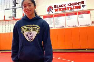 Samantha Yap, who is 9-1 in matches against all boys in the 106-pound weight class this season, is the first female wrestler to be named captain at Stamford High School. She is a junior.