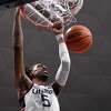 UConn’s Isaiah Whaley dunks in the second half against Georgetown on Tuesday in Storrs.