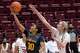 Cal guard Jayda Curry drives to the basket against Stanford forward Cameron Brink at Maples Pavilion on Friday night. Curry scored 30 points in the Bears’ loss.