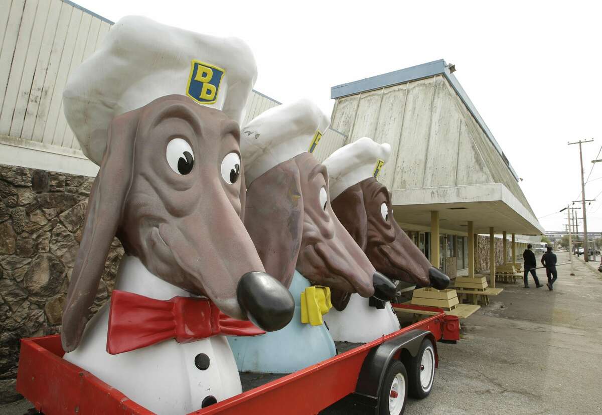 In this photo taken Friday, April 22, 2011, Doggie Diner heads sit on a trailer parked outside a building being used for storage and industrial use on Treasure Island in San Francisco.