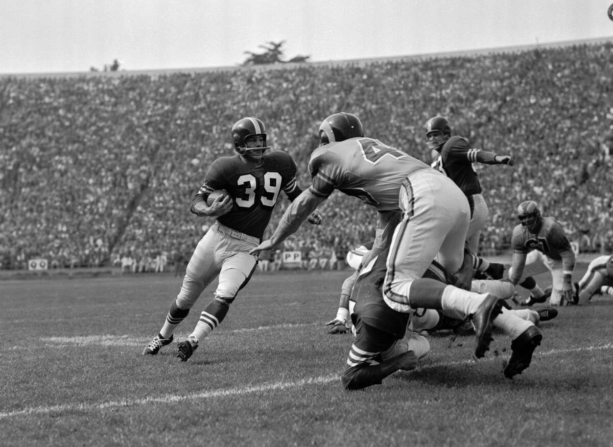 Sept. 25, 1955: Hugh McElhenny, San Francisco 49er halfback Hugh McElhenny gains 8 yards against the Los Angeles Rams at Kezar Stadium in San Francisco.