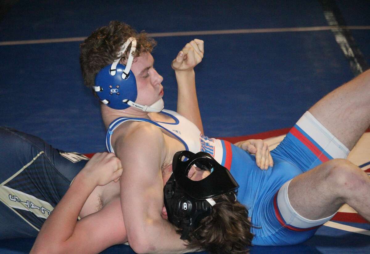 Chippewa Hills' Craig Wernette works on a pin against his Lakeview opponent on Friday.