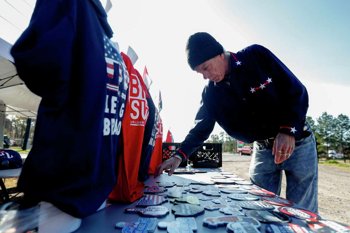 Bill Bailey, from Michigan, sets up a merchandise shop along South Loop 336 ahead of Saturday’s Save America rally where former President Donald Trump will speak at the Montgomery County Fairgrounds. “I think it’s going to be huge,” Bailey said of Saturday’s rally. “Especially when you combine the size of this metro, the support he has locally and the people come in from across the county.”