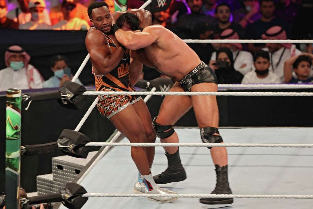 Big E competes with Drew McIntyre during a World Wrestling Entertainment show. (Photo by Fayez Nureldine/AFP via Getty Images)