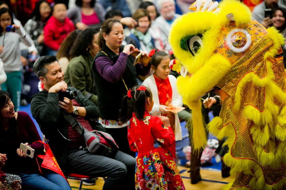 A lion dance greets the crowd at the Chinese Community Center's 2020 Lunar New Year festival. After going virtual in 2021, the festival is coming back in person on February 5.