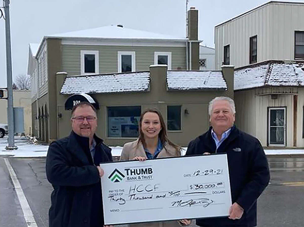 The Huron County Community Foundation Community Hub project received a $30,000 grant from Thumb Bank and Trust in early 2022. From left, Thumb Bank and Trust President and CEO Ben Schott,  Huron County Community Foundation Executive Director Mackenzie Price-Sundblad and Mike LePage, retired Thumb Bank and Trust Thumb Region president and Huron County Community Foundation Finance/Building Committee member are shown in a file photo.