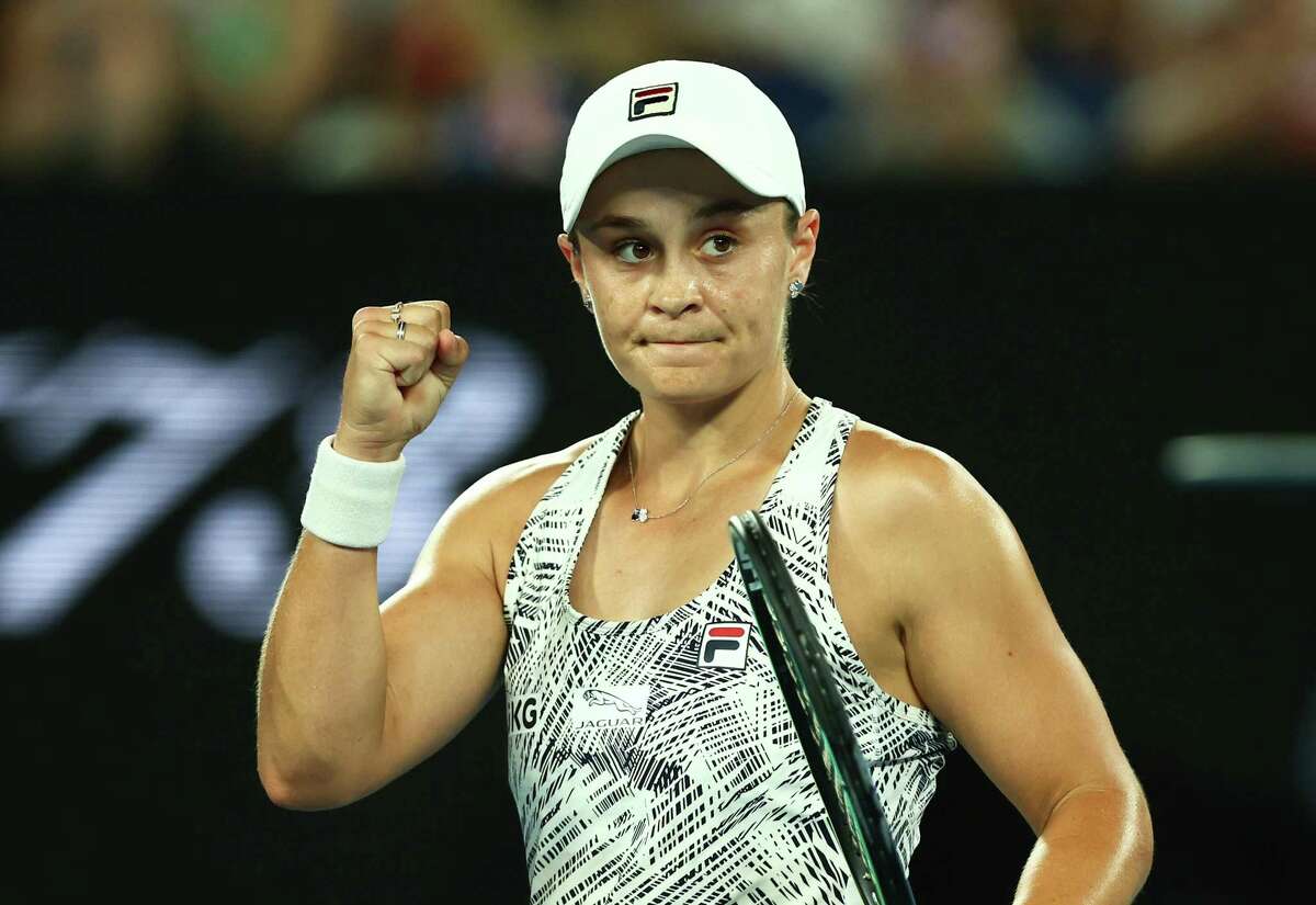 MELBOURNE, AUSTRALIA - JANUARY 27: Ashleigh Barty of Australia celebrates winning her Women's Singles Semifinals match against Madison Keys of United States during day eleven of the 2022 Australian Open at Melbourne Park on January 27, 2022 in Melbourne, Australia. (Photo by Clive Brunskill/Getty Images)