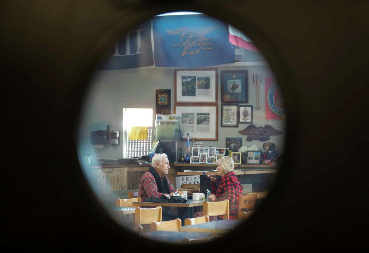 Sal Deleon and Barbara Fisher enjoy a quiet breakfast at Honor Cafe, Thursday, Jan. 27, 2022, in Conroe. The restaurant serves Messina Hof and Bernhardt Winery wines.