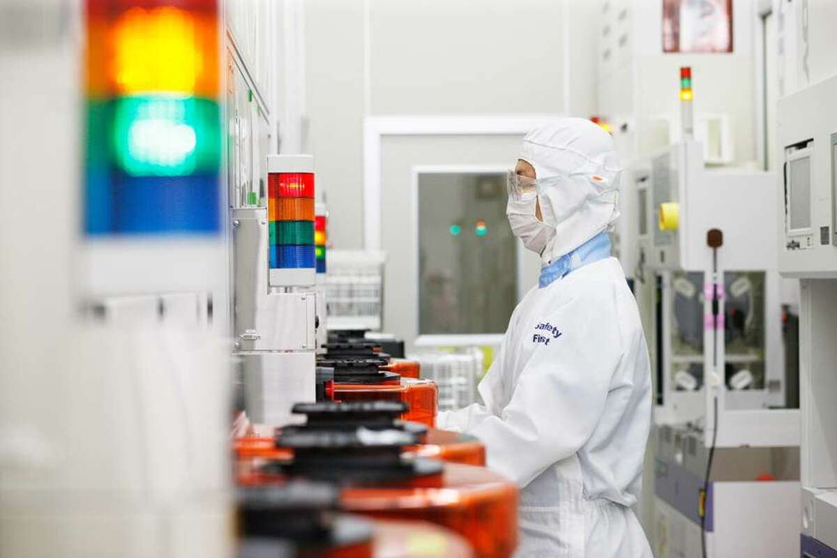 A Tokyo Electron worker at TEL's cleanroom at Albany Nanotech.