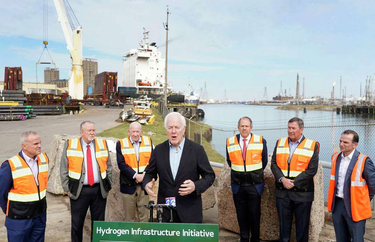 U.S. Senator John Cornyn speaks during a tour at Manchester Terminal after a discussion about the Hydrogen Infrastructure Initiative was held Thursday, Jan. 27, 2022 in Houston. Also shown are Bill Diehl, president Greater Houston Port Bureau, left, Stephen DonCarlos, commissioner Port of Houston Authority, Jim Teague, director and co-CEO Enterprise Products, Ric Campo, chairman of the Port Commission of the Port of Houston Authority, Monty Heins, director of Houston operations Dow Chemical, and Vinny Pilegge, president Manchester Terminal, right.