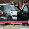 Police investigate the scene where three Houston police officers were shot near the intersection of McGowen and Hutchins Thursday, Jan. 27, 2022 in Houston.