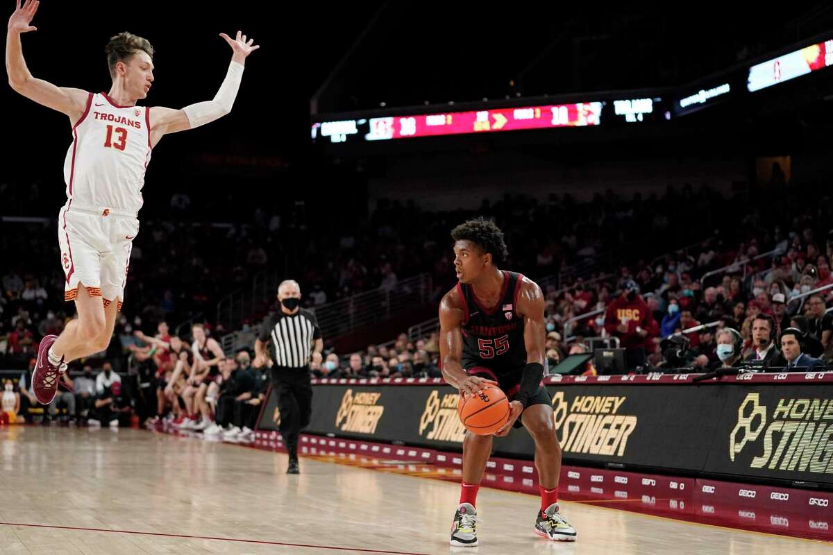 Stanford forward Harrison Ingram, right, gets set to shoot as Southern California guard Drew Peterson defends during the first half of an NCAA college basketball game Thursday, Jan. 27, 2022, in Los Angeles. (AP Photo/Mark J. Terrill)