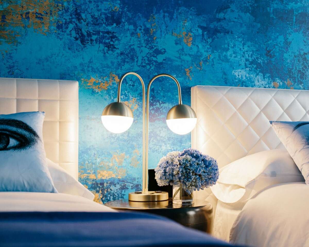 A photo of a St. Louis Blues-themed hotel room at Angad Arts Hotel in St. Louis