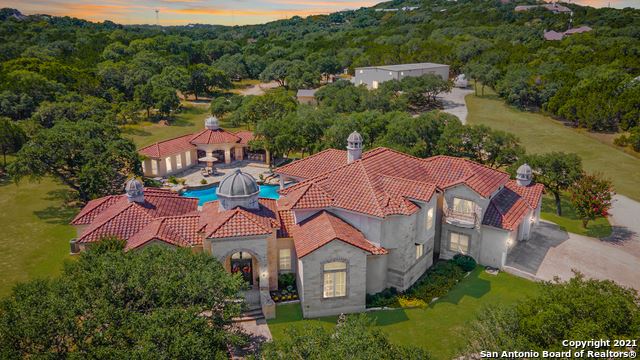 This Bulverde mansion's pool has four waterfalls. It's on the market for $3.1 million. - Vimarsana News