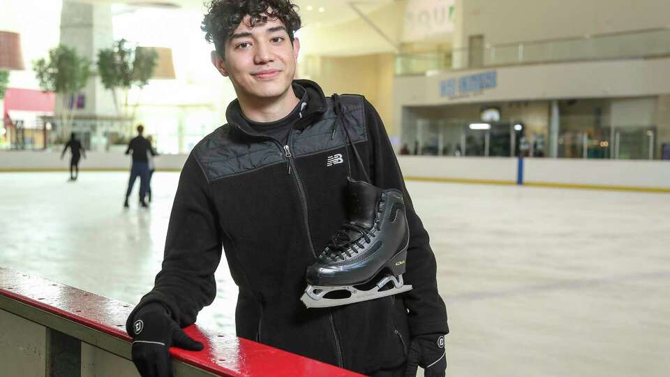 Portrait of John Esteban Catano Molina at the ice rink in the Memorial City Mall, Wednesday, Jan. 26, 2022, in Houston. John Esteban always dreamt of figure skating but there were no ice rinks in his hometown in Colombia. The 17-year-old moved to the U.S. with his parents a few years ago. He found himself at the ice rink at The Galleria and tried skating. He even taught himself to ice skate, practicing multiple times a week. Now he's doing double jumps with the encouragement of local coaches. As the Winter Olympics gets under way on Friday, there are many young people like Esteban with Olympic-like dreams - in a sport in which Black and Latino skaters are few - but they need support.