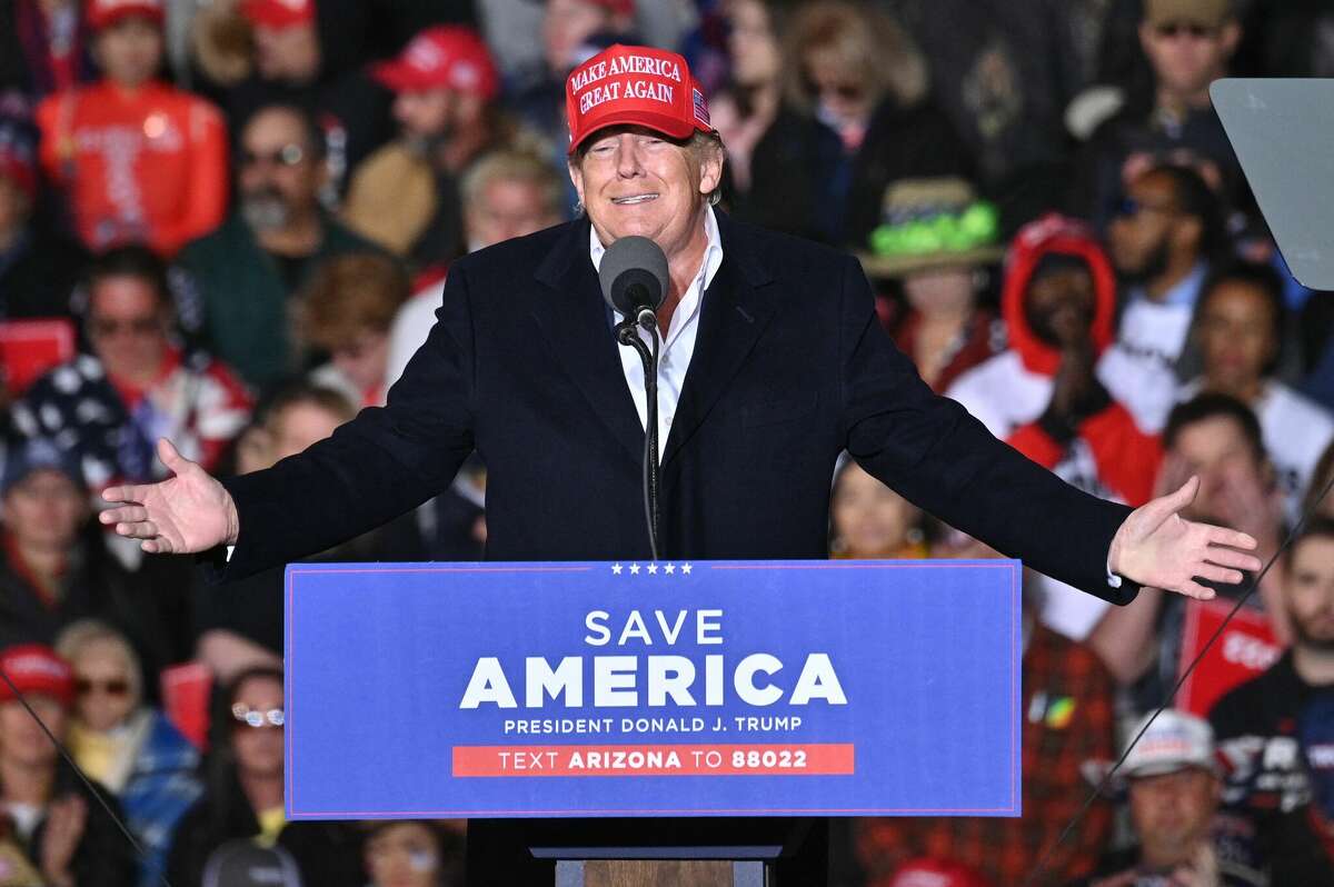 Former US President Donald Trump speaks during a rally at the Canyon Moon Ranch festival grounds in Florence, Arizona, southeast of Phoenix, on January 15, 2022. 