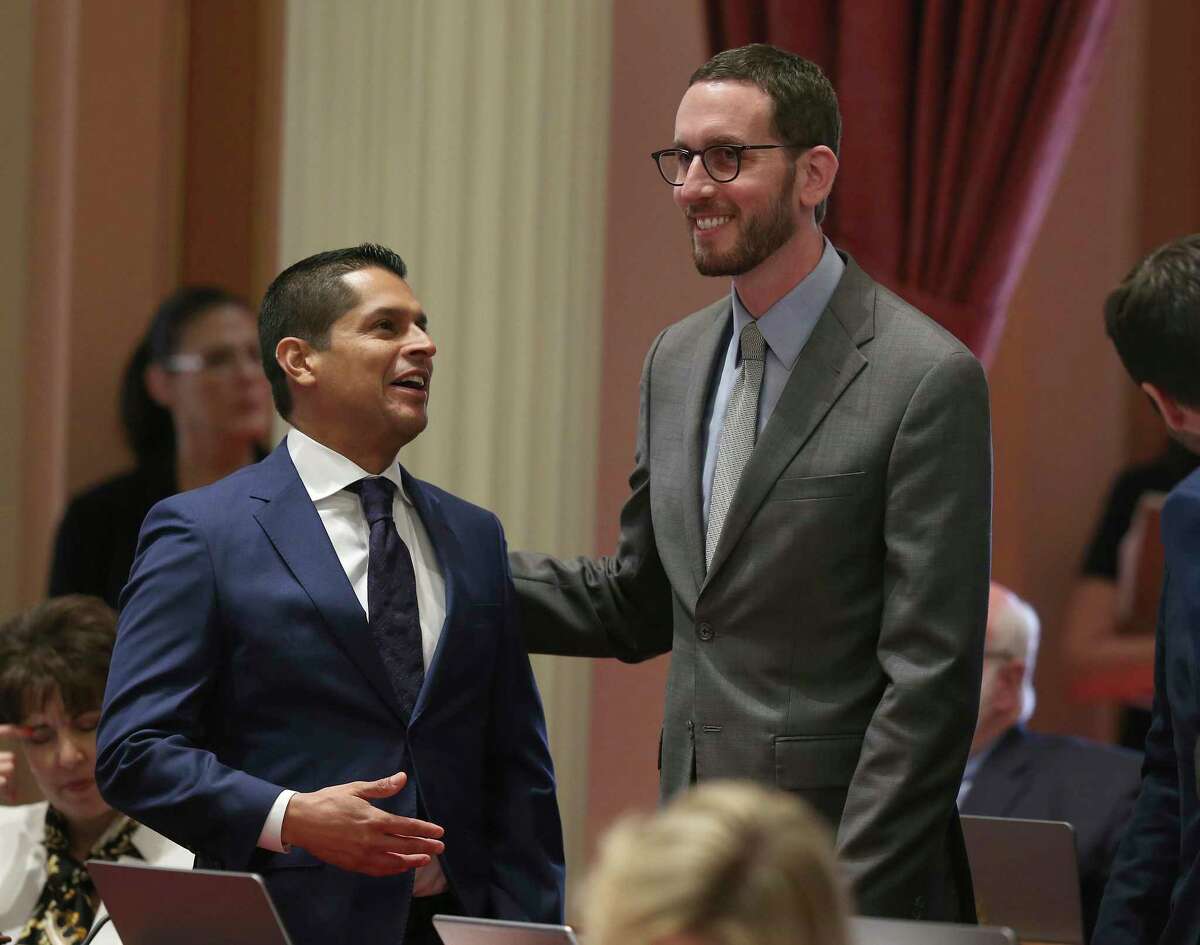 Telecom entities sued California for its net neutrality law, authored in 2018 by Sen. Scott Wiener (right), here with Assembly Member Miguel Santiago of Los Angeles.