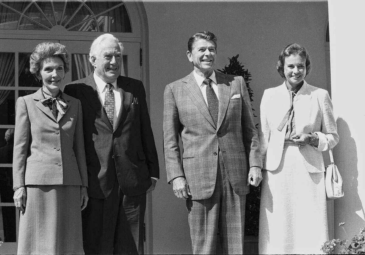** FILE ** Supreme Court Justice designate Sandra Day O'Connor poses with first lady Nancy Reagan, Chief Justics Warren Burger and President Ronald Reagan during a reception at the White House Sept. 24, 1981. O'Connor, the first woman on the Supreme Court and a swing vote on abortion as well as other contentious issues, announced her retirement Friday July 1, 2005. (AP Photo) Ran on: 07-02-2005 Justice designate OConnor (right), with (from left) Nancy Reagan, Chief Justice Warren Burger, President Ronald Reagan. Ran on: 07-02-2005 Justice-designate OConnor (right), with (from left) Nancy Reagan, Chief Justice Warren Burger, President Ronald Reagan. ALSO Ran on: 12-25-2005 Ronald Reagan and Bill Clinton both had an alcoholic parent, which William H. Chafe says can explain their personality traits.
