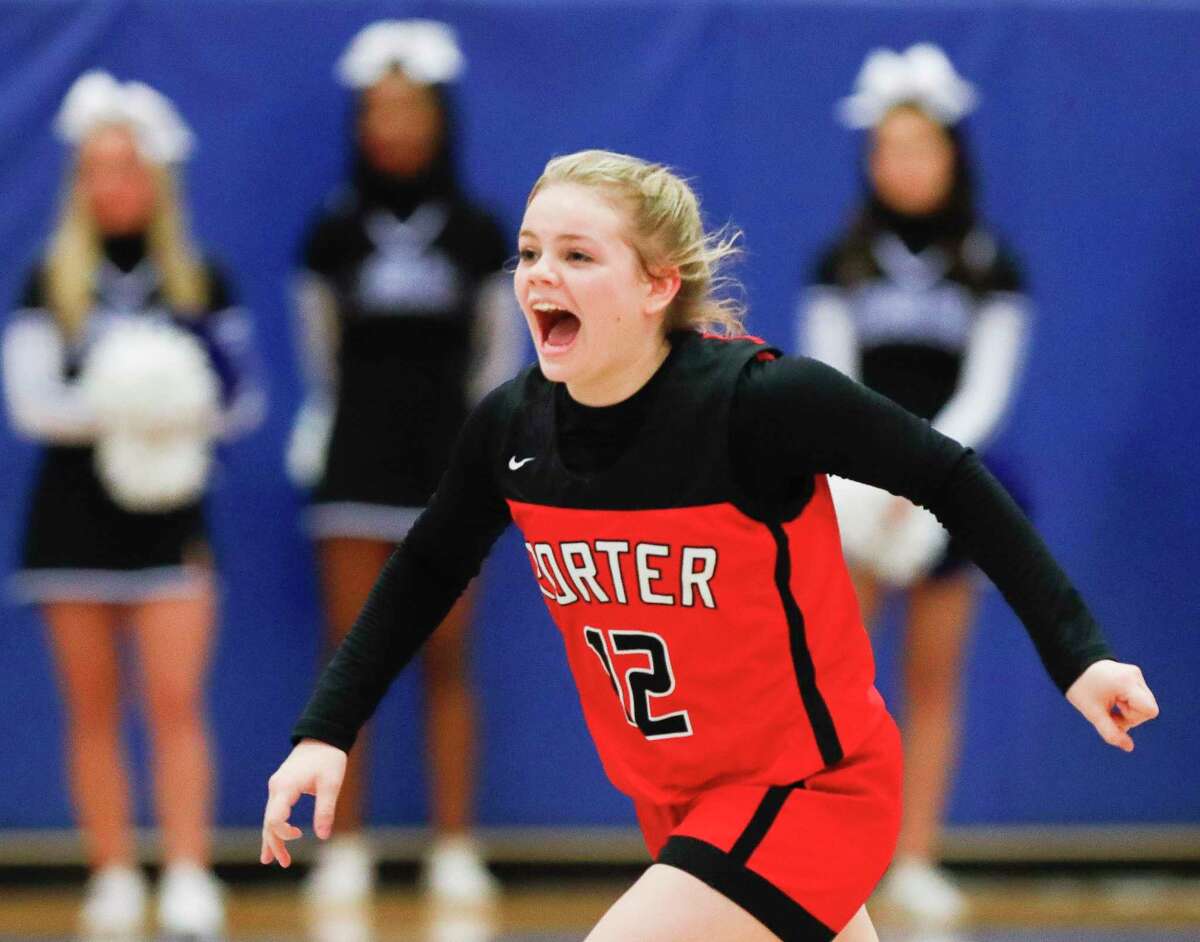 Porter point guard Allie Seybert (12) reacts after the team’s 34-28- win over New Caney during a District 20-5A high school basketball game at New Caney High School, Friday, Jan. 28, 2022, in New Caney.
