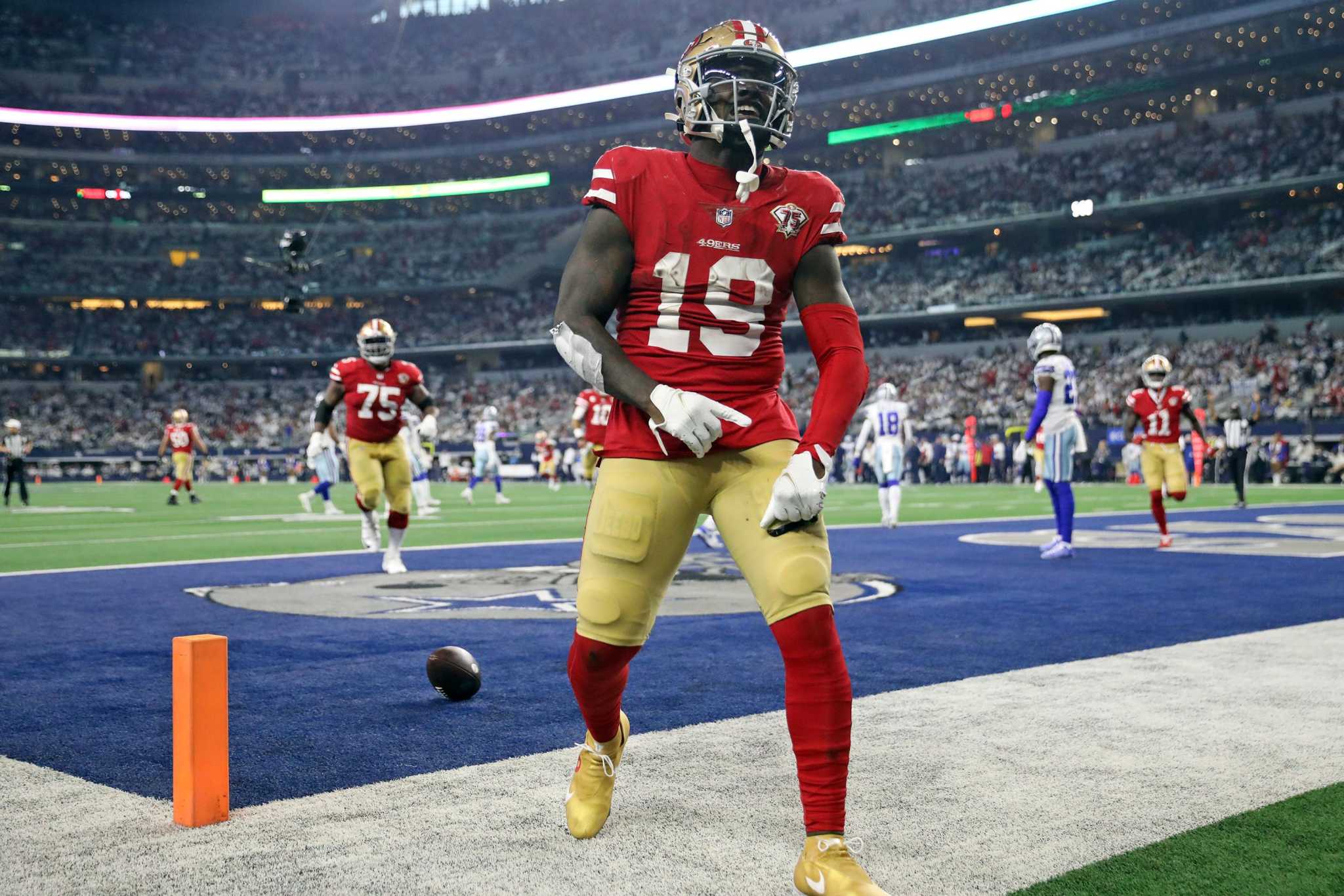 Deebo Samuel celebrates a touchdown scored against the Dallas Cowboys