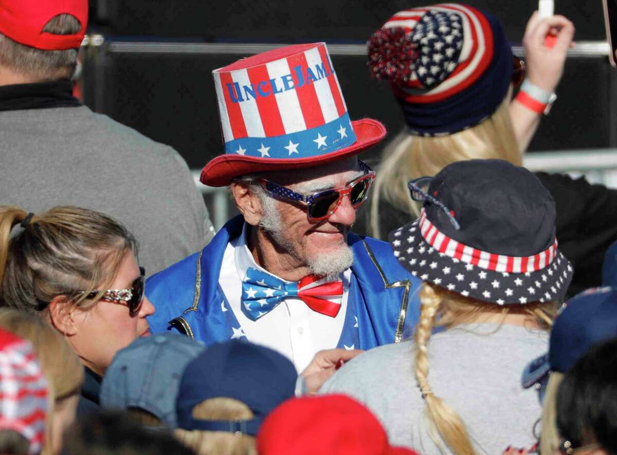 A man dressed as the Uncle Sam is seen before the Save America Rally where former President Donald Trump will speak, Saturday, Jan. 29, 2022, in Conroe.
