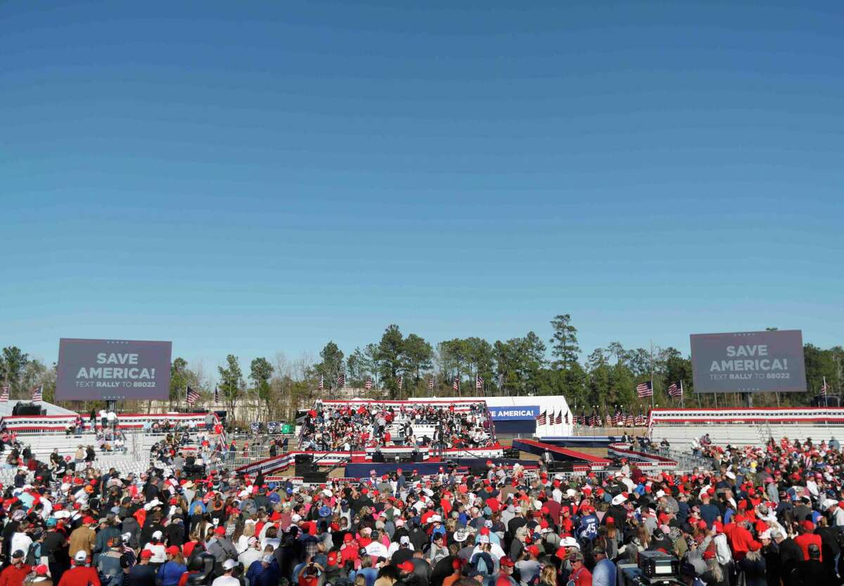 Crowds enter the Save America Rally where former President Donald Trump will speak, Saturday, Jan. 29, 2022, in Conroe.