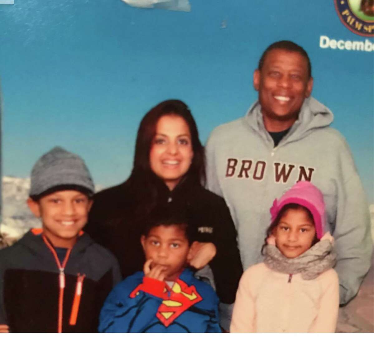 Dr. Gregory Belcher and his wife, Dr. Vilaqsni Ganesh - both now in prison for false billing of insurance companies - and their children, Raymond, David and Rea, are shown in an undated family photo