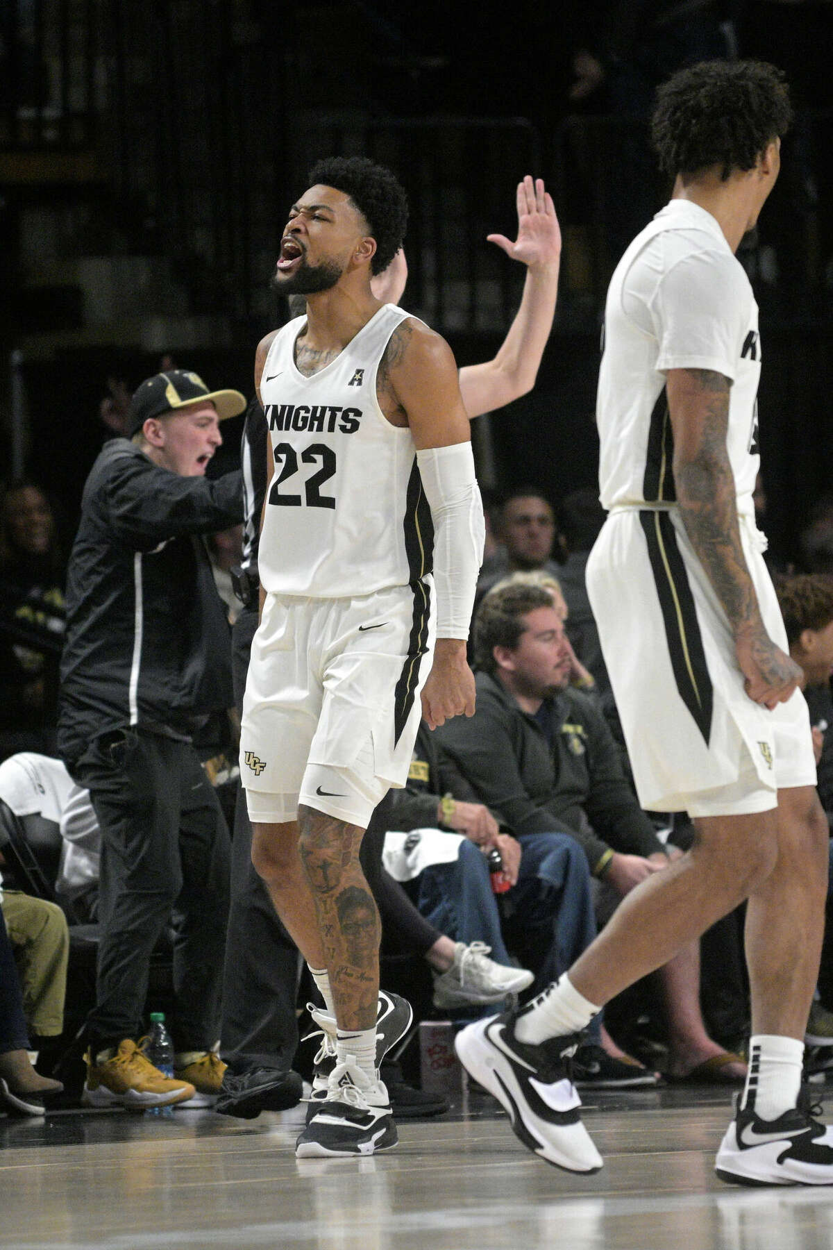 Central Florida guard Darin Green Jr. (22) celebrates after scoring a 3-point basket during the first half of an NCAA college basketball game against Houston, Saturday, Jan. 29, 2022, in Orlando, Fla. (AP Photo/Phelan M. Ebenhack)