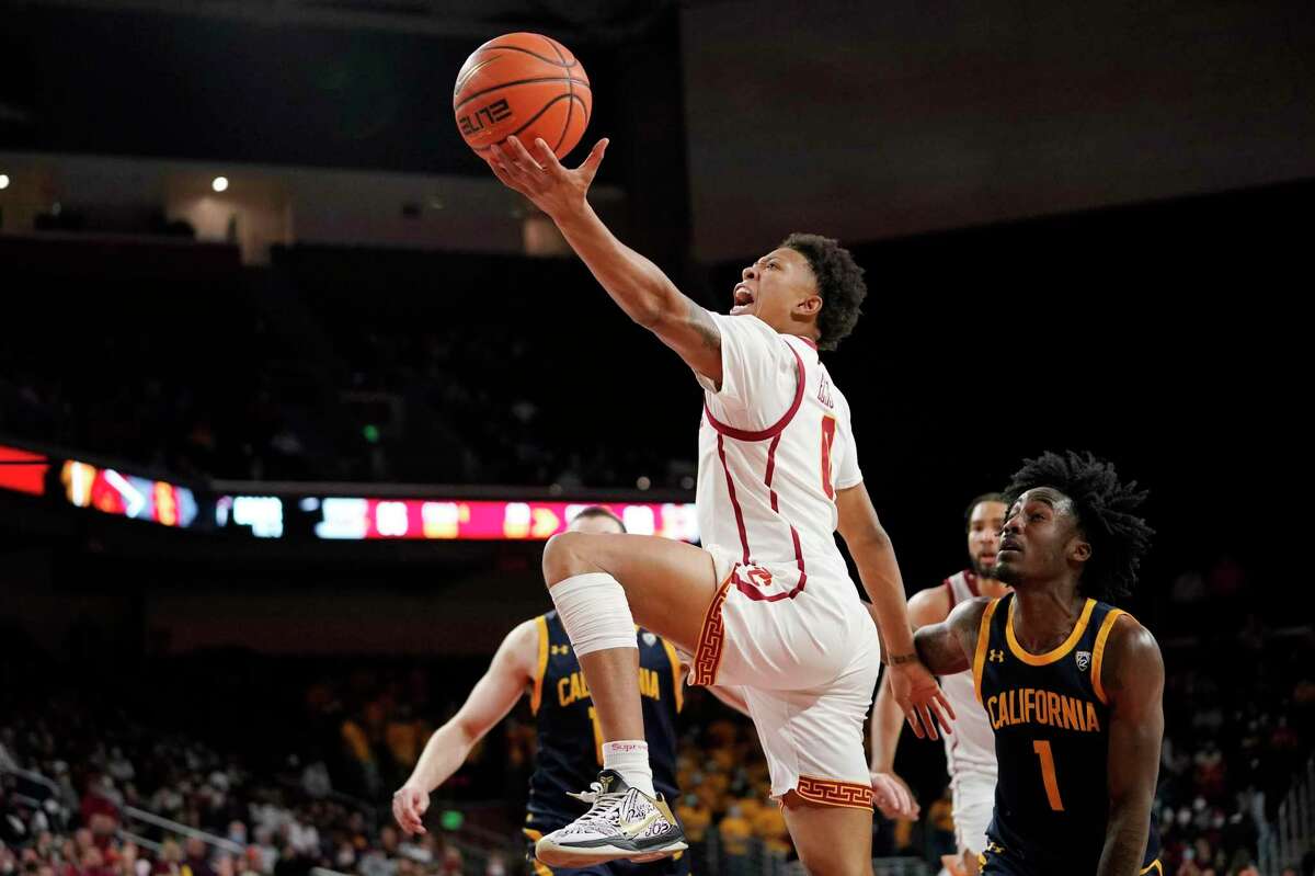 USC guard Boogie Ellis shoots as Cal guard Joel Brown defends during the second half of an NCAA college basketball game Saturday, Jan. 29, 2022, in Los Angeles. (AP Photo/Mark J. Terrill)