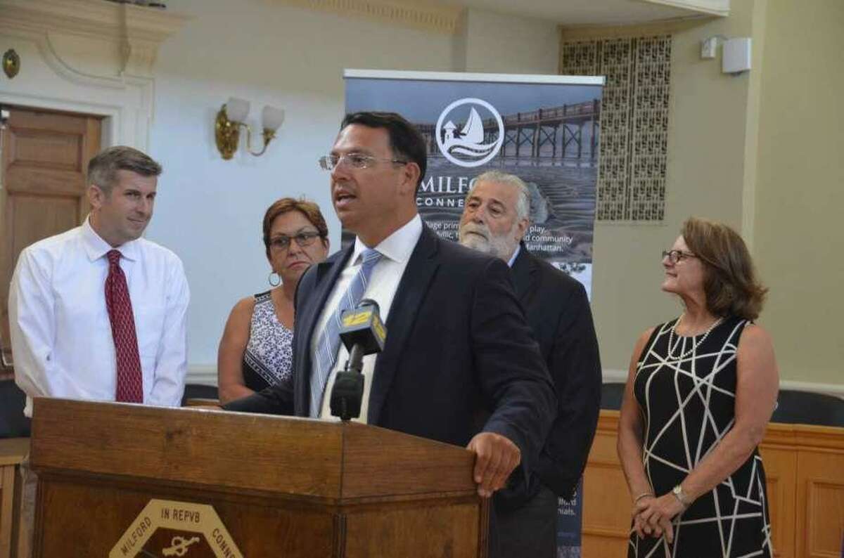 In this file photo, Milford Mayor Ben Blake announces at a press conference in  that the city has met the state requirements for a moratorium on affordable housing developments allowed under the state's 8-30g housing statute.